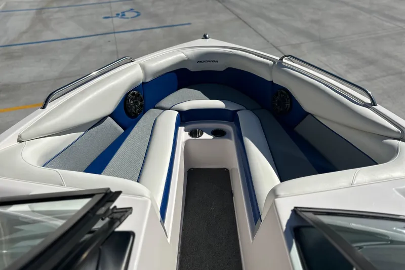 Slide: The Image of 2015 Moomba Mobius LSV boat interior with steering wheel and seating. - 44