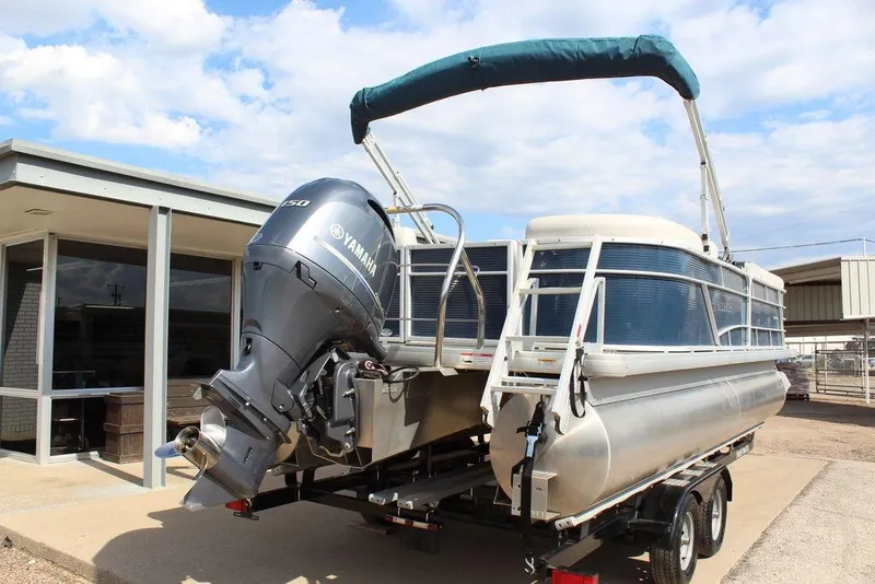 Slide: The Image of 2023 Godfrey Sweetwater 2286 C Sport Tube pontoon boat with Yamaha engine on trailer. - 8