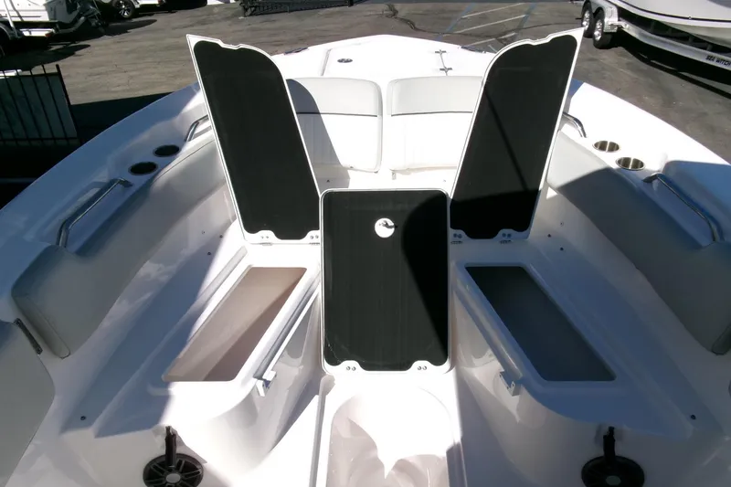 Slide: The Image of 2024 Sea Fox 248 Commander boat interior with open storage compartments. - 12