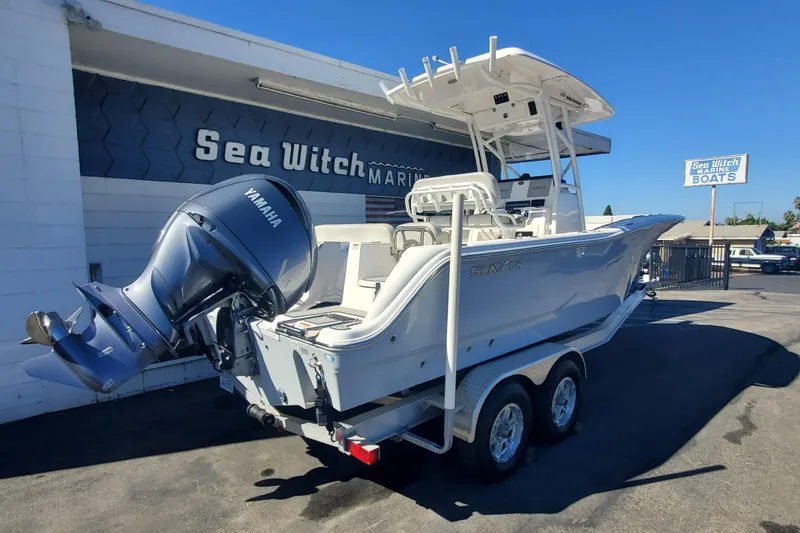 Slide: The Image of 2024 Sea Fox 248 Commander boat with Yamaha engine at Sea Witch Marine dealership. - 2