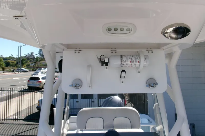 Slide: The Image of 2024 Sea Fox 248 Commander boat interior with mounted fire extinguisher and speaker. - 20