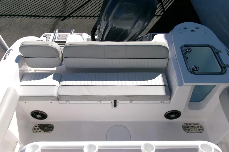 Slide: The Image of 2024 Sea Fox 248 Commander boat interior with seating and storage compartments. - 25