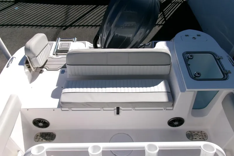 Slide: The Image of 2024 Sea Fox 248 Commander boat interior with seating and storage compartments. - 26