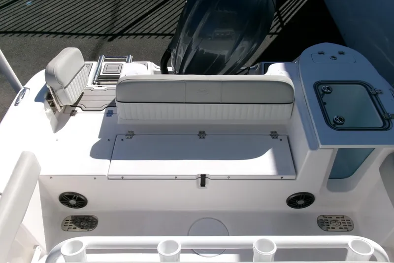 Slide: The Image of 2024 Sea Fox 248 Commander boat interior with seating and storage compartments. - 27
