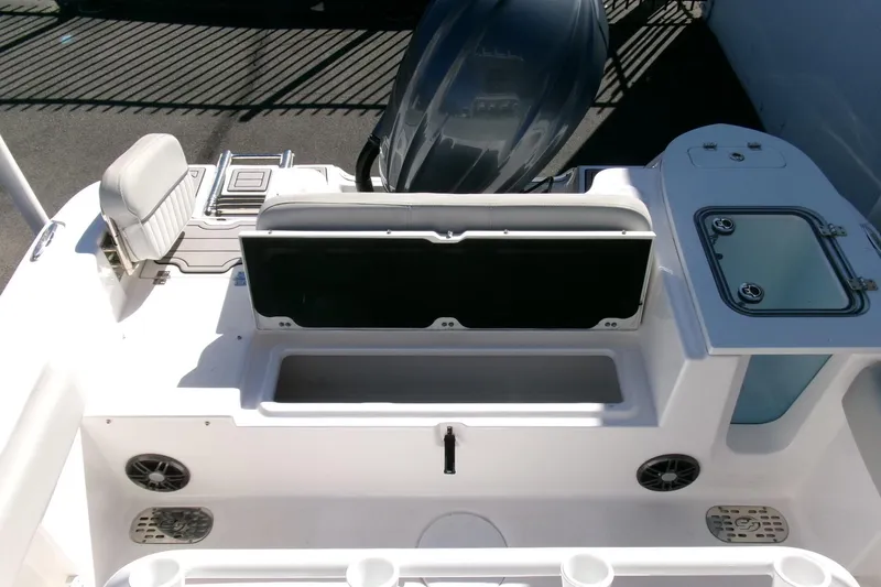 Slide: The Image of 2024 Sea Fox 248 Commander boat interior with seating and storage compartments. - 28