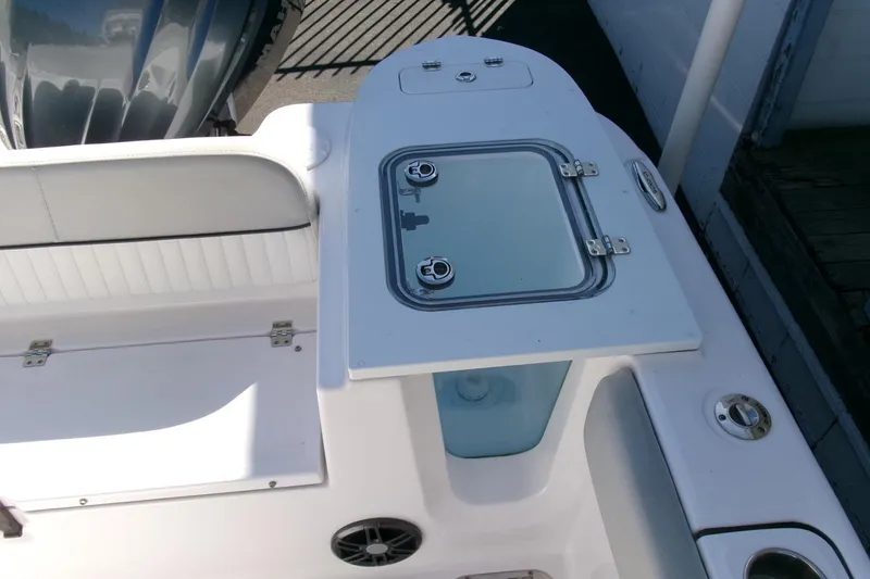 Slide: The Image of 2024 Sea Fox 248 Commander boat interior with seating and storage compartments. - 29
