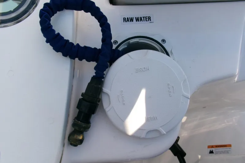 Slide: The Image of Raw water hose connection on 2024 Sea Fox 248 Commander boat. - 31