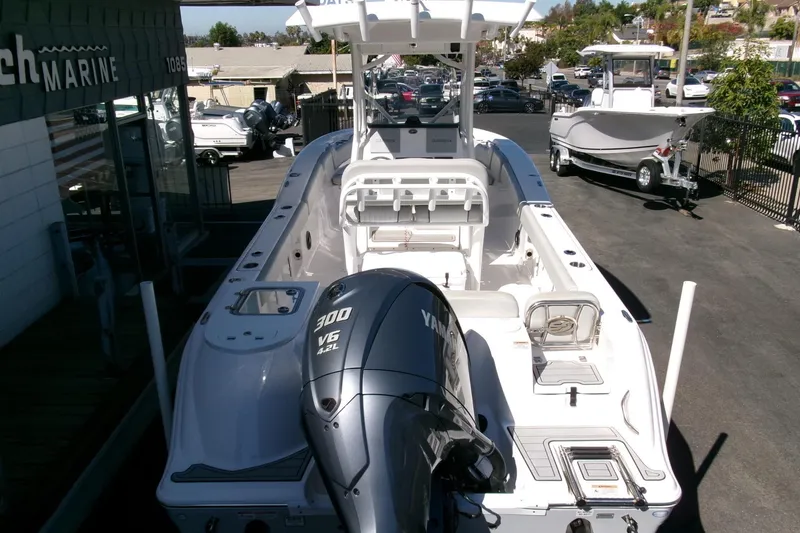 Slide: The Image of 2024 Sea Fox 248 Commander boat with Yamaha 300 V6 engine at a dealership. - 38