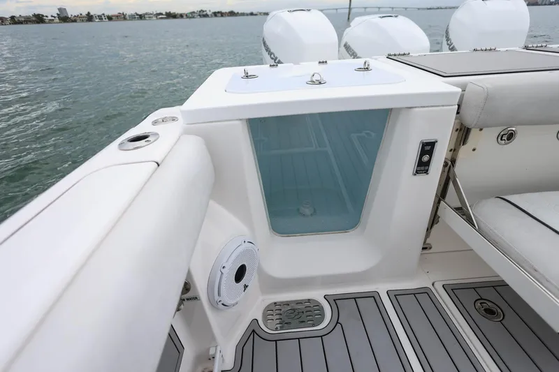 Slide: The Image of 2022 Sea Fox 368 Commander boat interior with seating and storage compartments. - 11