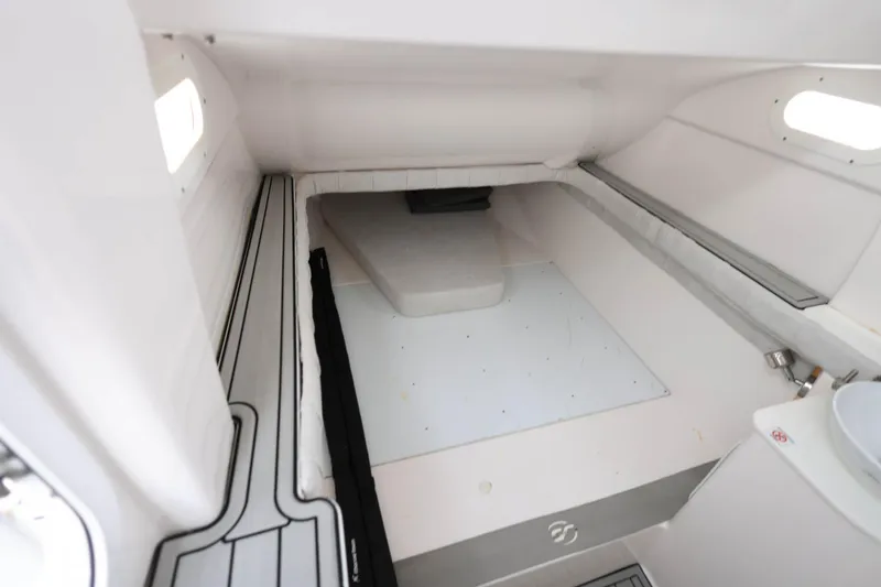 Slide: The Image of Interior cabin of 2022 Sea Fox 368 Commander boat, featuring a compact sleeping area. - 24