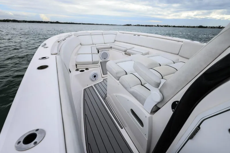 Slide: The Image of 2022 Sea Fox 368 Commander boat interior with luxurious seating on open water. - 25