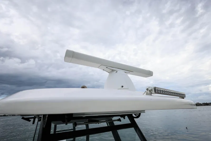 Slide: The Image of Radar and light bar on 2022 Sea Fox 368 Commander boat under cloudy sky. - 26