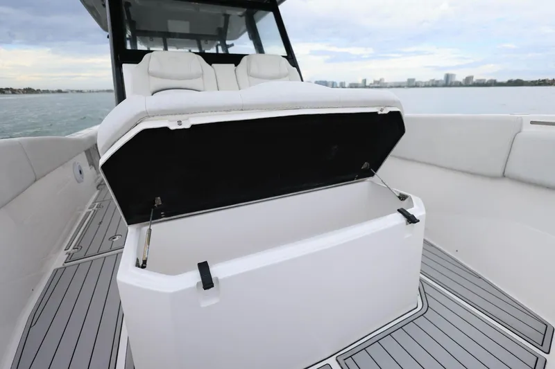 Slide: The Image of 2022 Sea Fox 368 Commander boat with open storage compartment on deck. - 28
