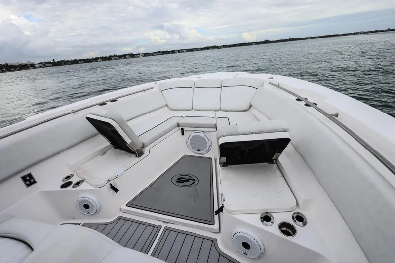 Slide: The Image of 2022 Sea Fox 368 Commander boat interior with seating, on calm water. - 31