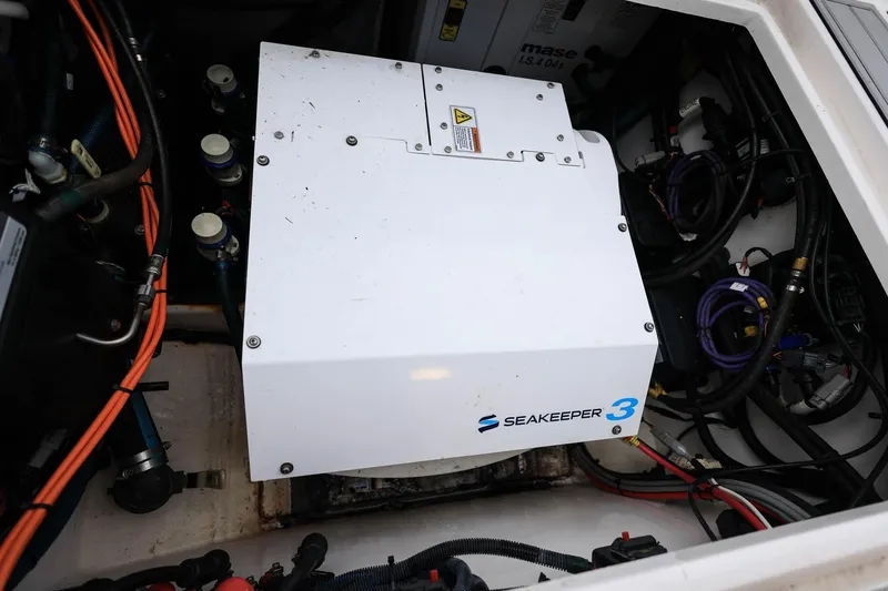 Slide: The Image of Engine compartment of 2022 Sea Fox 368 Commander with Seakeeper 3 stabilizer system. - 39