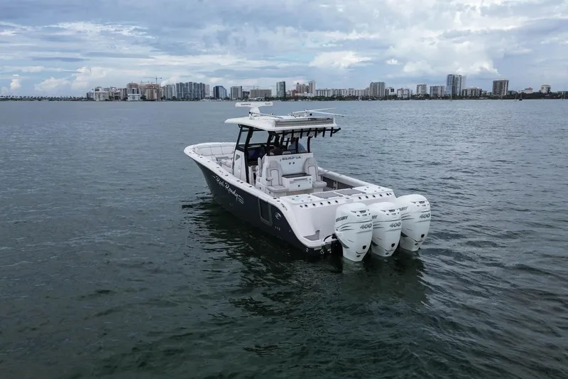 Slide: The Image of 2022 Sea Fox 368 Commander boat with triple Mercury 400 engines on open water. - 5