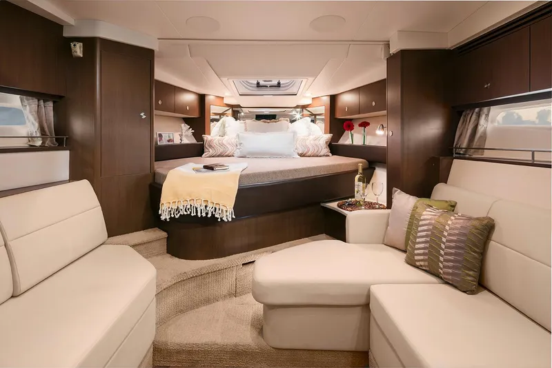 Slide: The Image of Luxurious interior of 2018 Sea Ray Sundancer 350 yacht with elegant seating and cozy bed. - 9