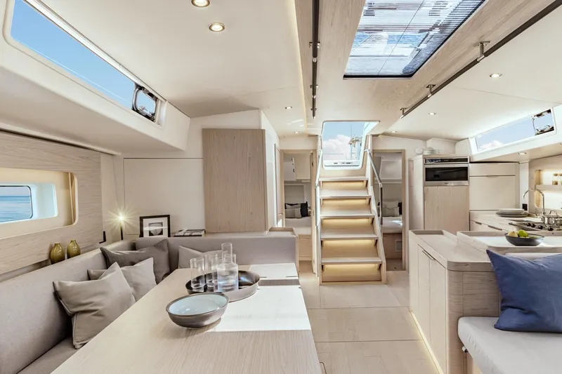 Slide: The Image of Luxurious interior of 2026 Beneteau Oceanis Yacht 54 with modern design and natural lighting. - 15