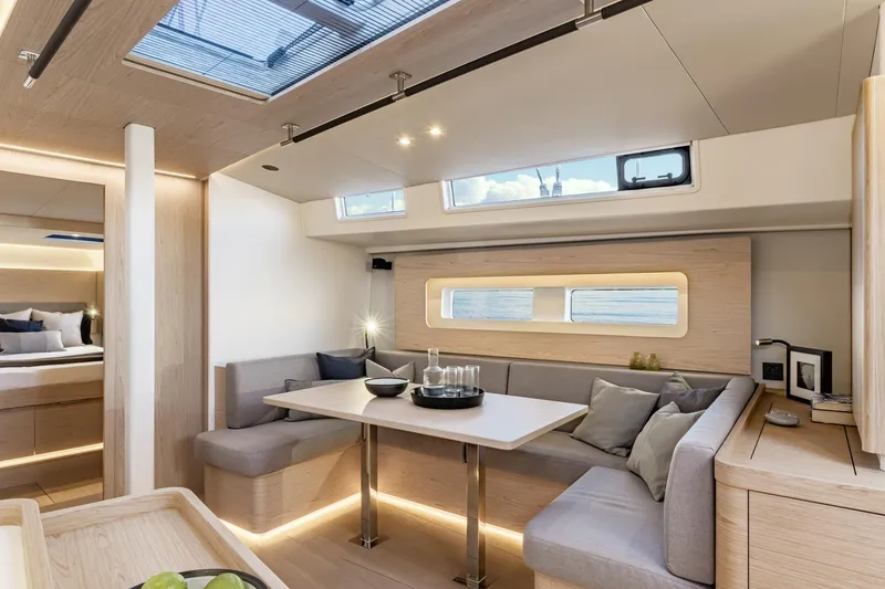 Slide: The Image of Luxurious interior of 2026 Beneteau Oceanis Yacht 54, featuring modern seating and elegant design. - 16