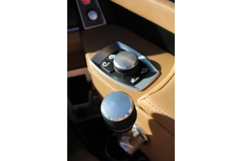 Slide: The Image of 2026 MasterCraft XT22 control panel with sleek design and modern features. - 18