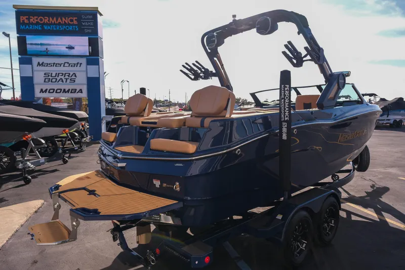 Slide: The Image of 2026 MasterCraft XT22 boat at Performance Marine Watersports dealership. - 9