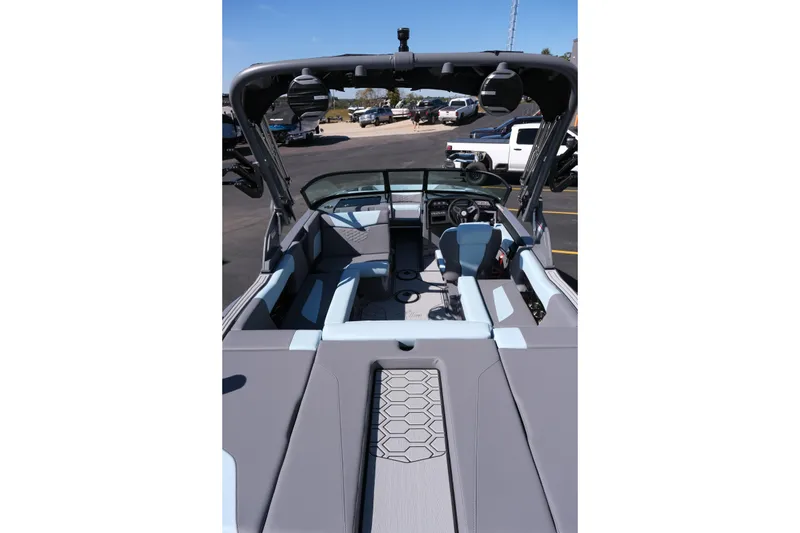 Slide: The Image of 2026 MasterCraft NXT20 boat interior with modern seating and sleek design. - 9