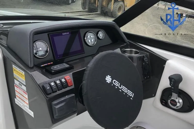 Slide: The Image of Cockpit of 2022 Monterey M4 boat with Gussi Italia steering wheel and Simrad display. - 2