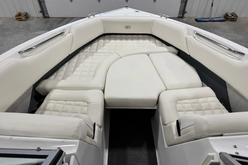 Slide: The Image of 2018 Cobalt R5 Surf boat interior with luxurious white seating and quilted design. - 13
