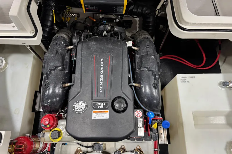 Slide: The Image of Engine compartment of a 2018 Cobalt R5 Surf boat with Volvo Penta 350 V8 engine. - 14
