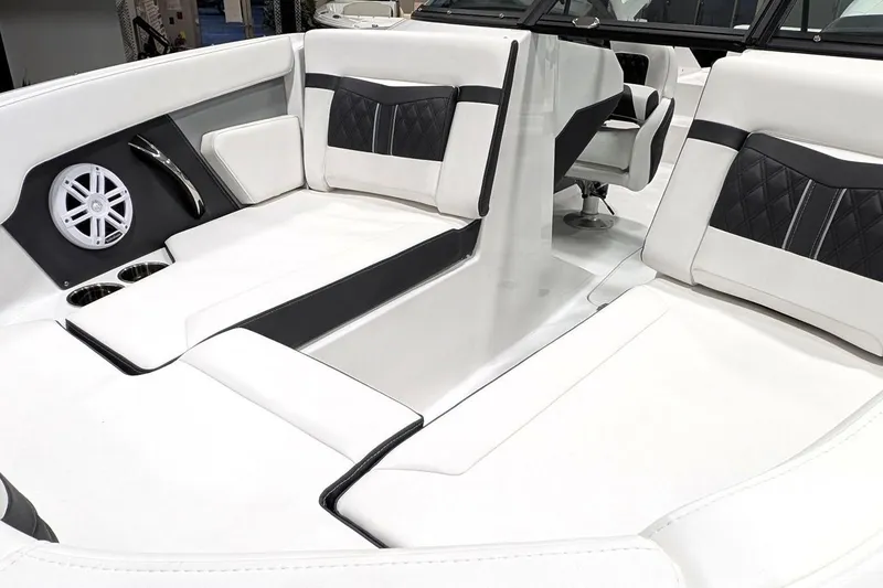 Slide: The Image of Luxurious interior of 2025 Monterey M-205 boat with sleek white and black seating. - 10
