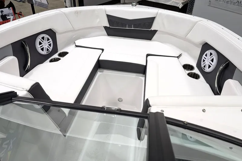 Slide: The Image of Luxurious interior of 2025 Monterey M-205 boat with white seating and speakers. - 11
