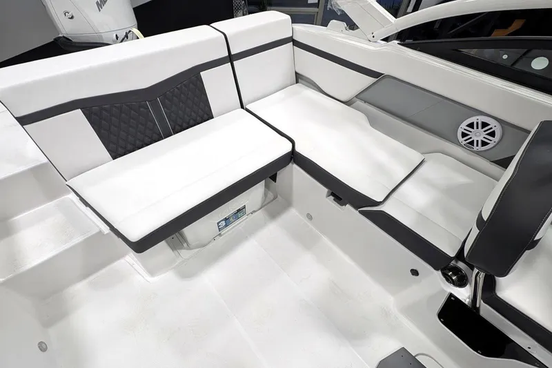 Slide: The Image of 2025 Monterey M-205 boat interior with white and black seating, featuring modern design elements. - 4