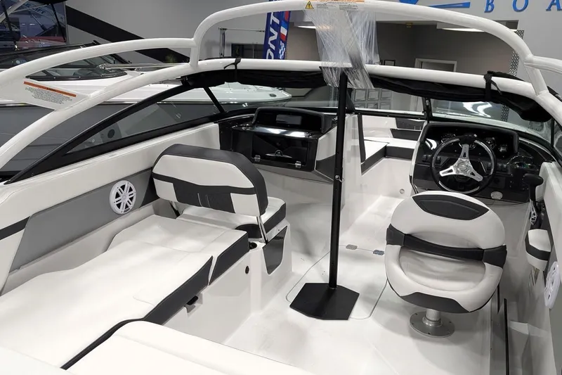 Slide: The Image of 2025 Monterey M-205 boat interior with modern seating and sleek dashboard design. - 6