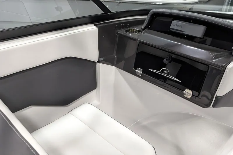 Slide: The Image of Interior of 2025 Monterey M-205 boat, featuring sleek seating and modern dashboard design. - 9