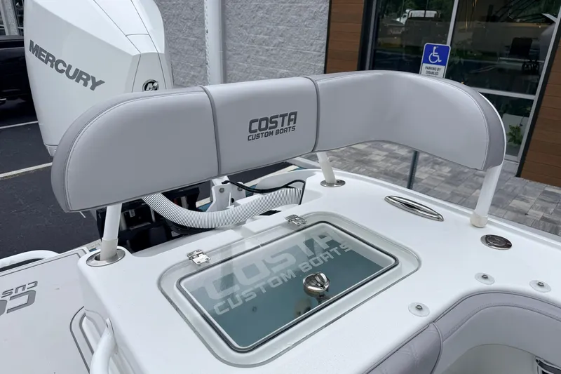 Slide: The Image of 2022 Costa Custom Boats 264 with Mercury engine, featuring sleek design and modern amenities. - 15