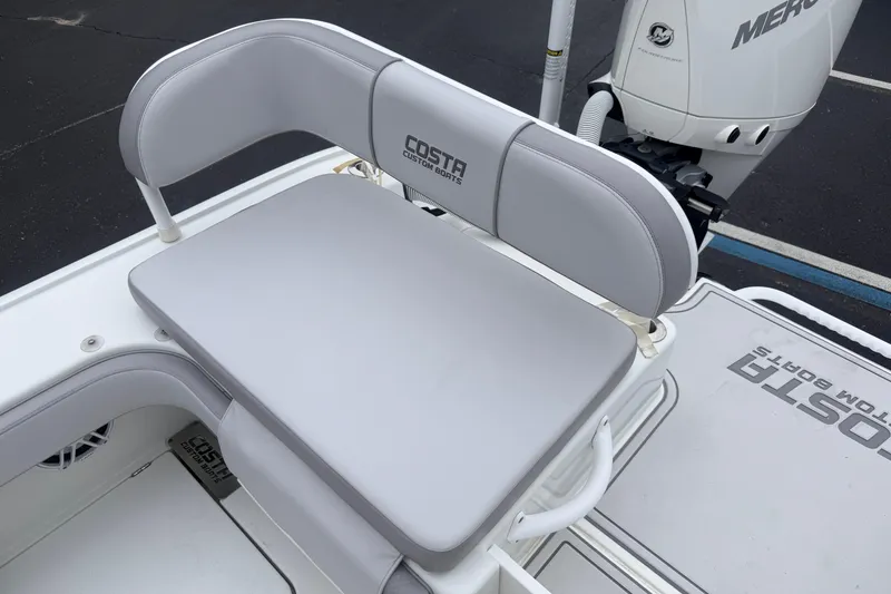 Slide: The Image of 2022 Costa Custom Boats 264, featuring sleek seating and a powerful Mercury engine. - 16
