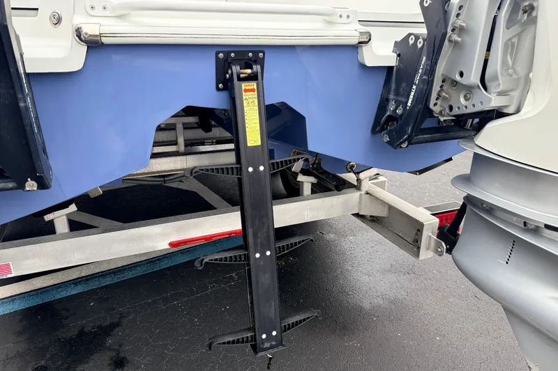 Slide: The Image of Costa Custom Boats 264, 2022 model, rear view with trailer and motor details. - 27