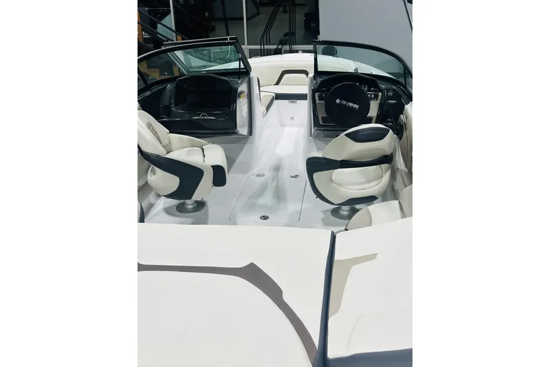 Slide: The Image of 2025 Monterey 224FS boat interior with modern seating and steering wheel design. - 10
