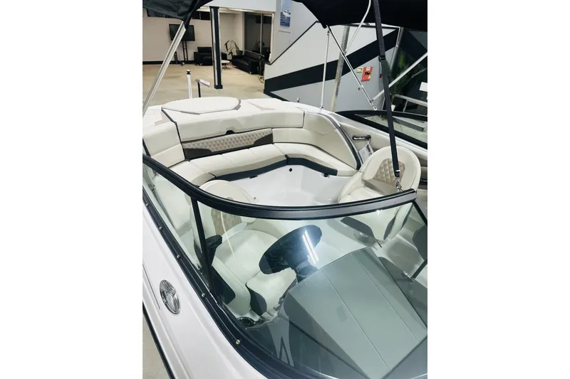 Slide: The Image of 2025 Monterey 224FS boat interior with sleek design and comfortable seating. - 13