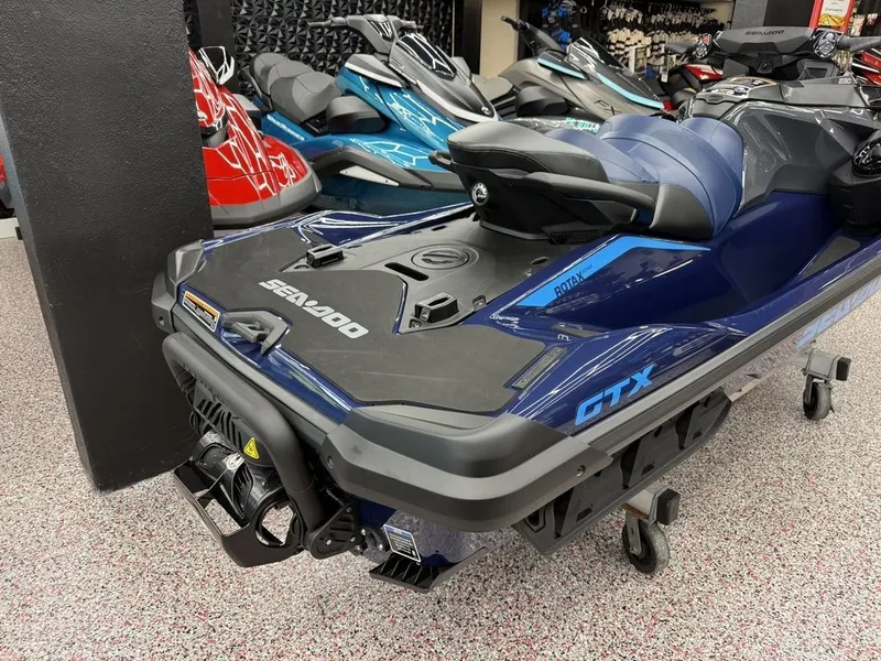 Slide: The Image of 2026 Sea-Doo GTX 230 jet ski in a showroom. - 10