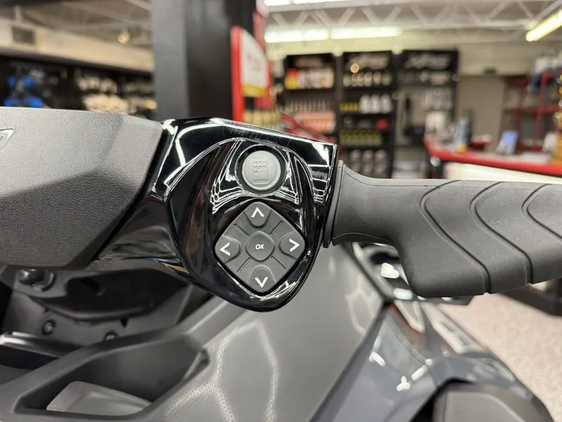Slide: The Image of Close-up of Sea-Doo GTX 230 2026 handlebar controls. - 12