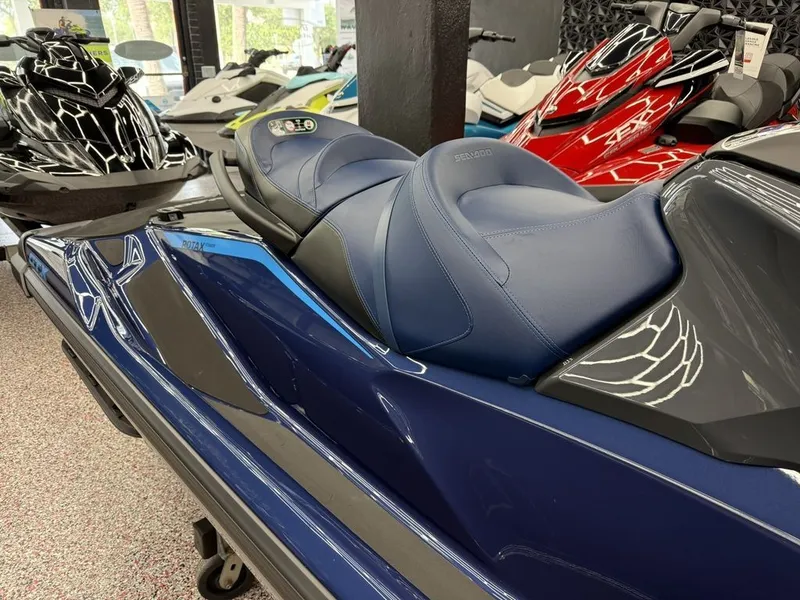 Slide: The Image of 2026 Sea-Doo GTX 230 jet ski in a showroom. - 5