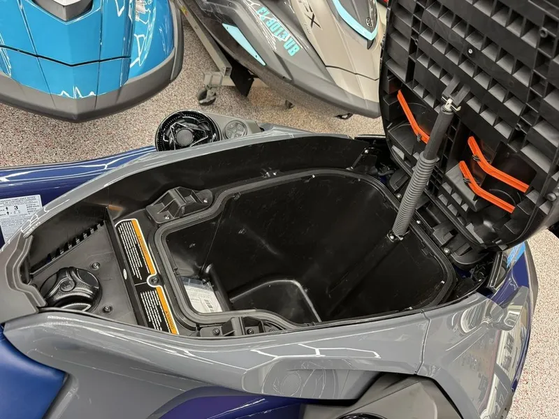 Slide: The Image of 2026 Sea-Doo GTX 230 storage compartment with open lid. - 7