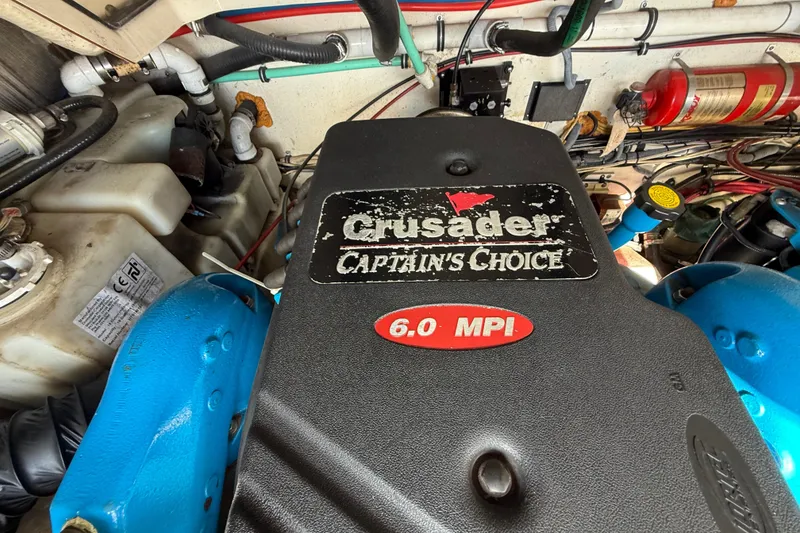 Slide: The Image of Engine compartment of a 2004 Pursuit 3100 Offshore with Crusader 6.0 MPI engine. - 30