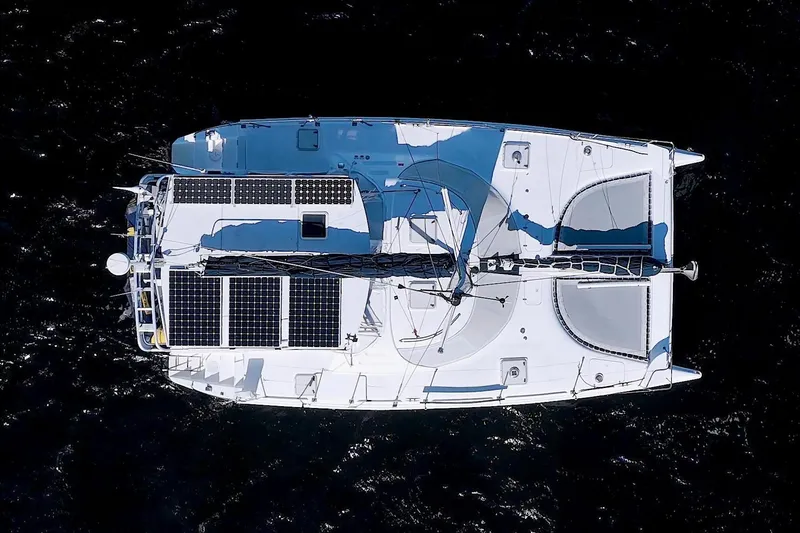 Slide: The Image of Aerial view of 1996 Manta 40 catamaran with solar panels on deck. - 1