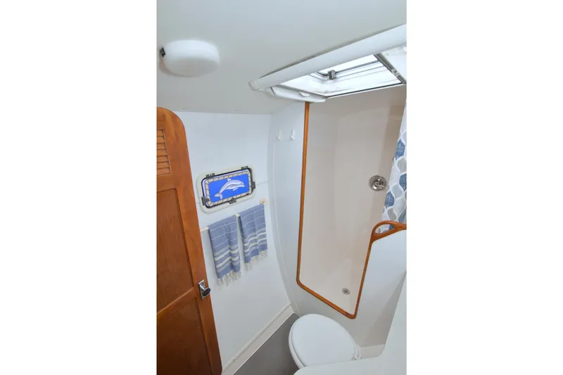 Slide: The Image of Bathroom interior of 1996 Manta 40 yacht with shower and nautical decor. - 60