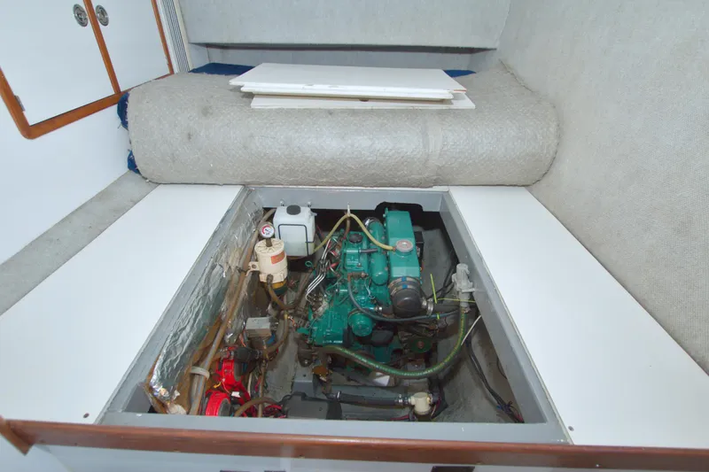 Slide: The Image of 1996 Manta 40 engine compartment with visible machinery and components. - 69