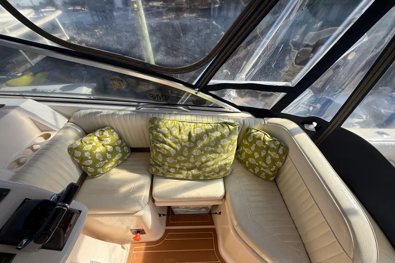 Slide: The Image of 2005 Grady-White Express 330 dashboard with Furuno and Yamaha marine electronics. - 14