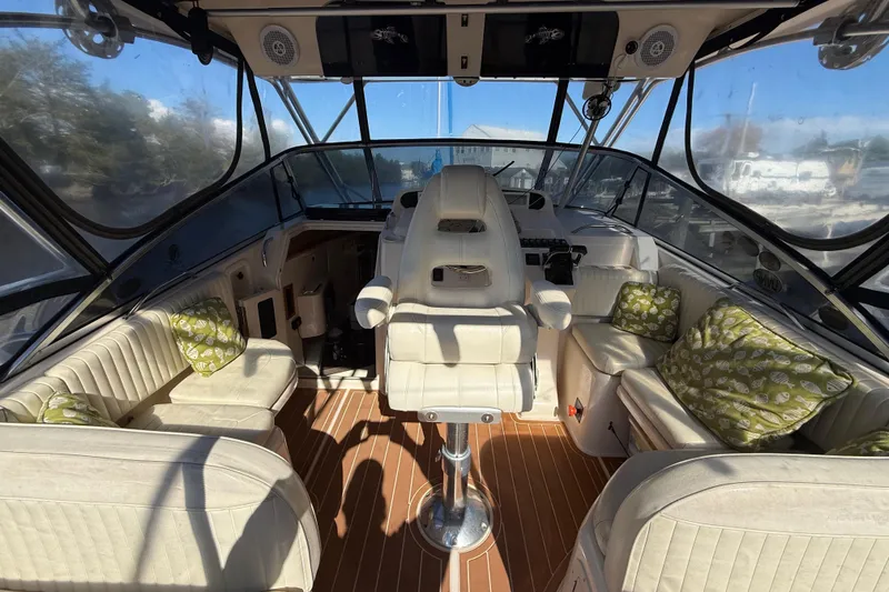 Slide: The Image of Interior cabin of 2005 Grady-White Express 330 with bed and luggage. - 22