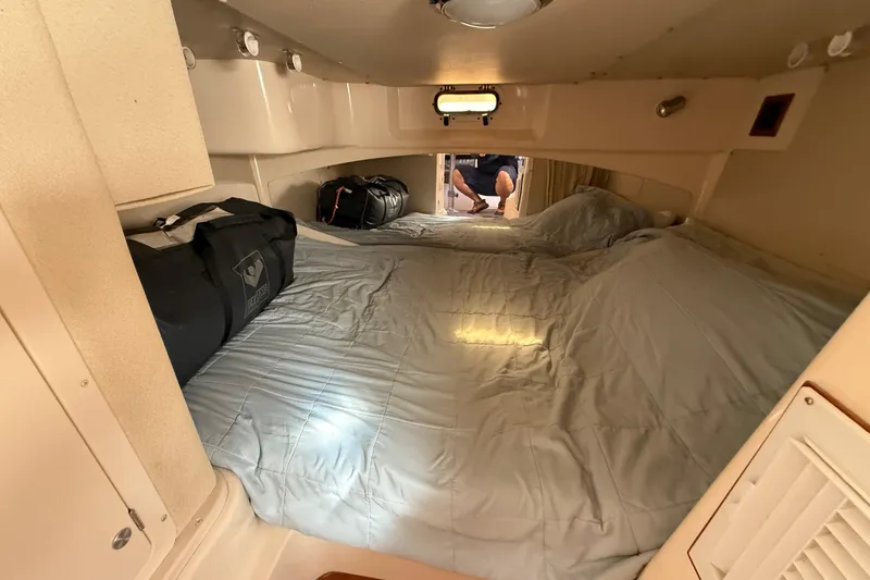 Slide: The Image of Electrical panel of a 2005 Grady-White Express 330 boat with digital displays. - 24